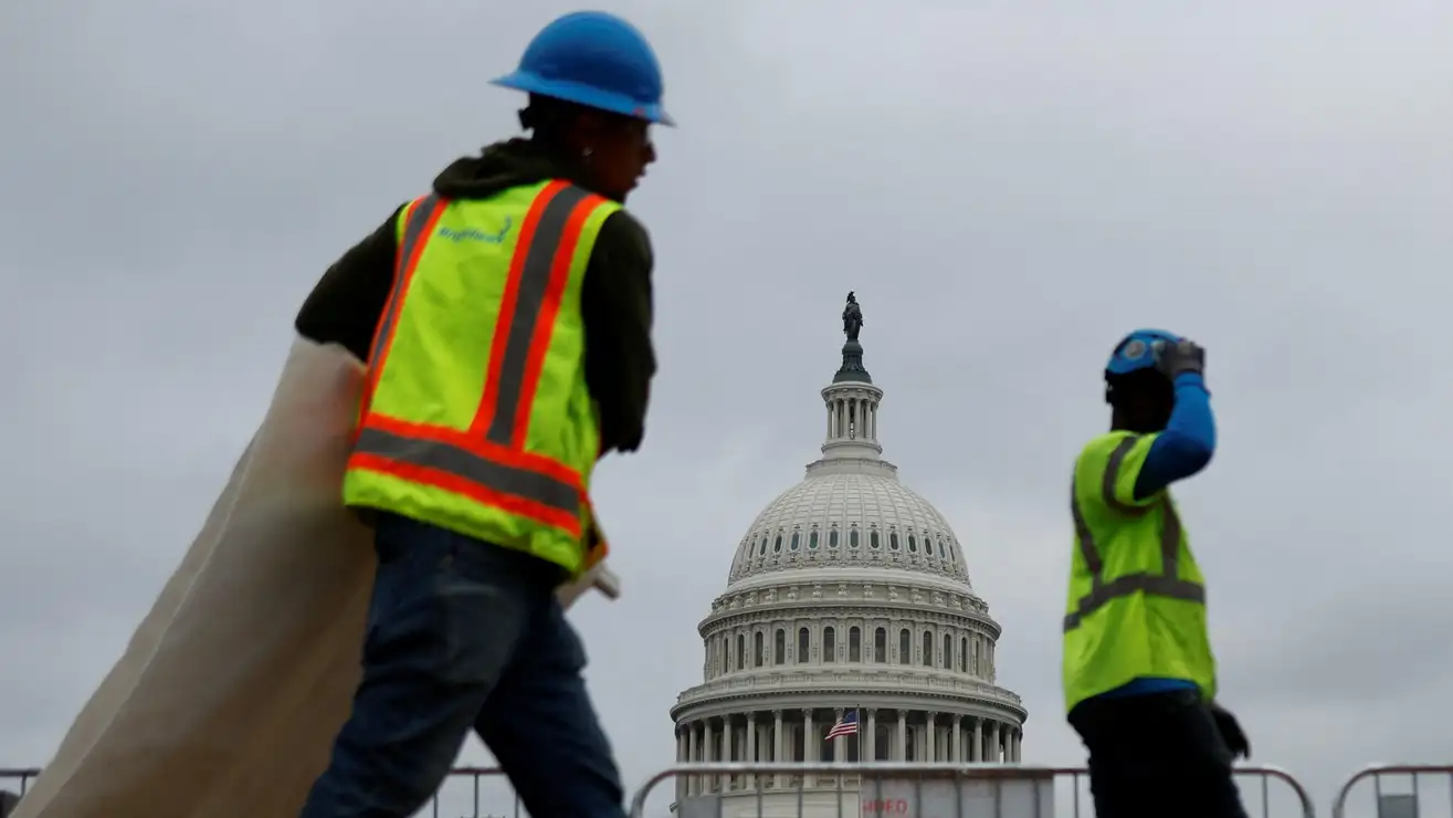 Construction workers near the US Capitol in Washington, DC.Image: Jonahtan Ernst (Reuters)